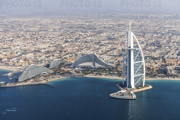 Dubai Burj Al Arab luxury hotel aerial view aerial view by the sea from above in Dubai, United Arab