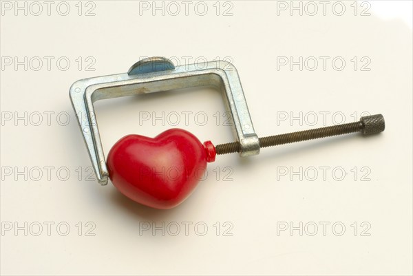 Heart in clamp screw, heart pain, cut-out, object