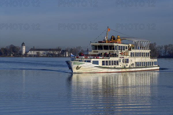 Excursion boat on the Chiemsee in winter, behind Fraueninsel, Upper Bavaria, Bavaria, Germany,