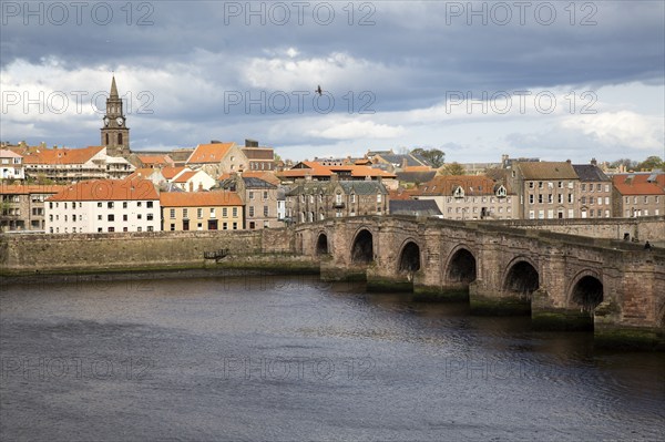 Historic stone bridge crossing River Tweed, Berwick-upon-Tweed, Northumberland, England, UK