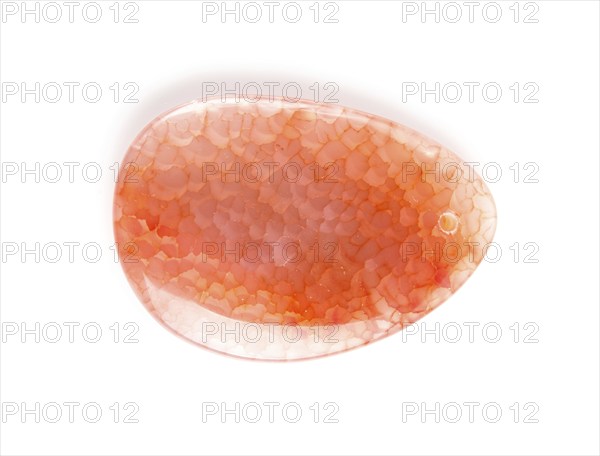 Colored onyx pendant isolated on white background, close up