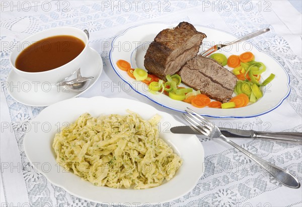 Swabian cuisine, roast beef, roast ox, herb spaetzle, meat dish, gravy, carrot vegetables, leek,