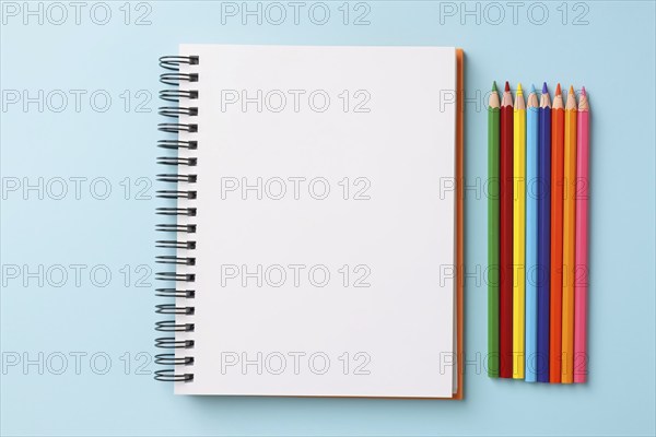Empty blank notebook with colorful pencils. KI generiert, generiert, AI generated