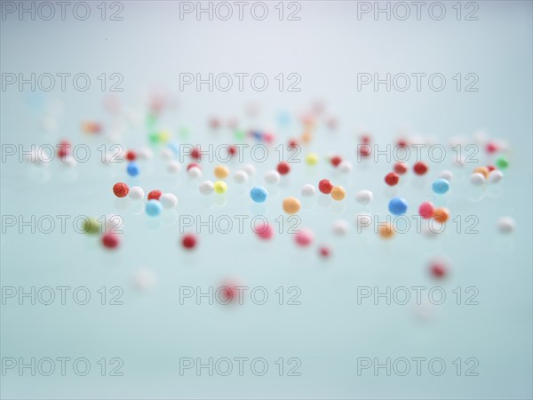 Colourful nonpareils, sugar pearls, sprinkle decorations in bright colours, mini sugar balls for