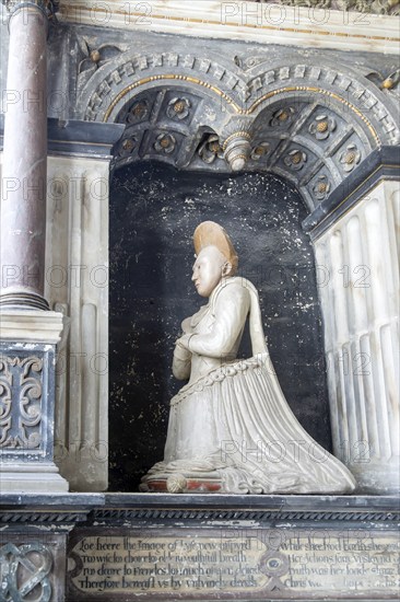 Woman kneeling family memorial monument, Kedington church, Suffolk, England, UK, Grissell