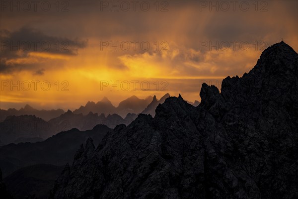 Montafon mountains with dramatic cloudy sky at sunrise, Tschagguns, Rätikon, Montafon, Vorarlberg,