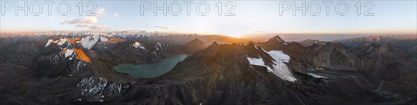 Evening mood, mountain panorama, aerial view, 4000 metre peak with glacier, mountain pass and