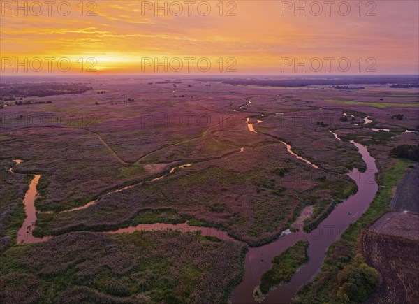 Sunrise over the meandering riverbed of the Narew and the Narew National Park, Narwianski Park