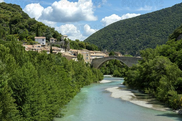 Nyons located in the Baronnies. The old bridge crossing the l'eygues river, Alpes de Haute Provence