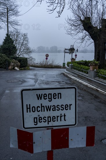 High water on the Rhine at Düsseldorf-Kaiserswerth, foggy weather, riverside paths and Rhine