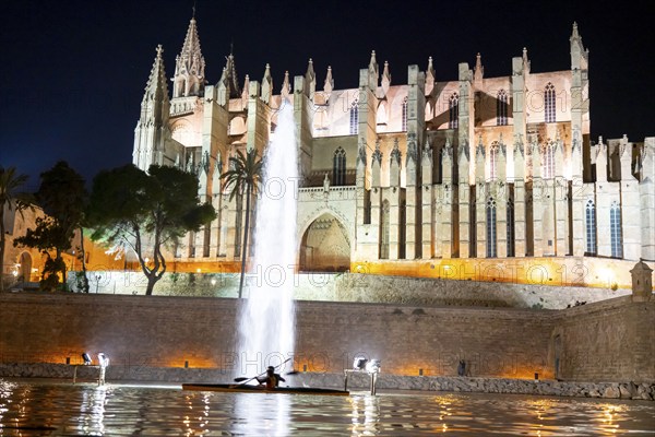 Palma de Majorca, Bay of Palma, the Cathedral of St Mary, kayakers in the lake in front of the