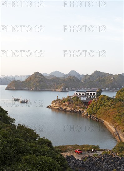 Cat Ba Island and the karst rocks of Lan Ha Bay in the evening light, Halong Bay, Vietnam, Asia