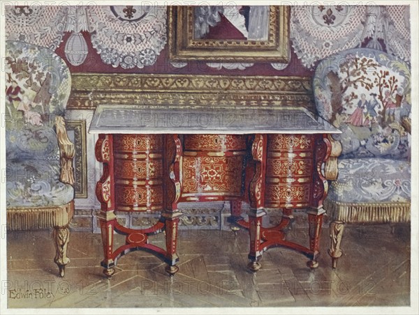 Furniture from around the turn of the century 1900, desk with kneehole in red tortoiseshell.
