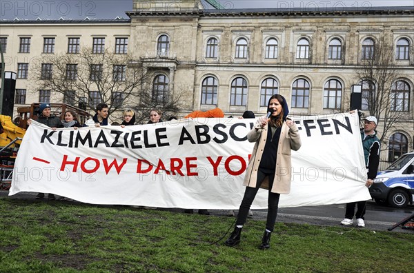 Luisa Neubauer speaks during a demonstration by Fridays for Future for compliance with climate