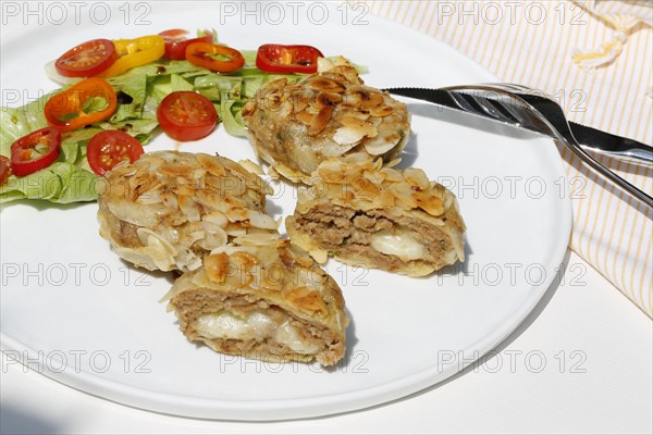 Swabian cuisine, meatballs wrapped in almonds, mixed minced meat, meatballs filled with cheese,