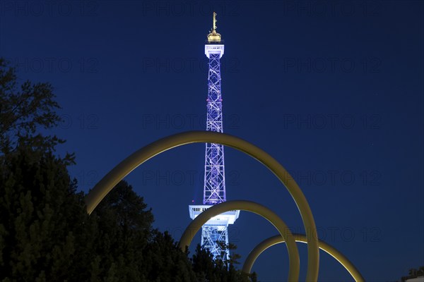 The radio tower shines in the colours of the IFA (Internationale Funkausstellung) on the exhibition