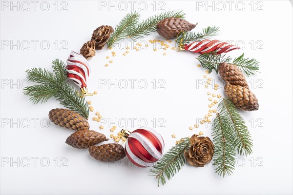 Christmas or New Year wreath composition. Decorations, balls, cones, fir and spruce branches, on