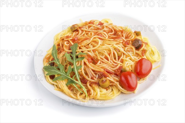 Corn noodles with tomato sauce and arugula isolated on white background. Side view, close up