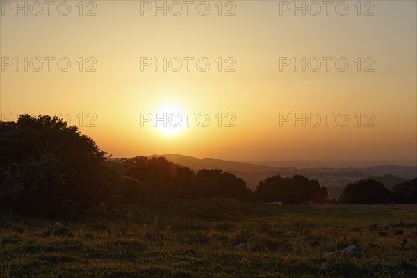 Sunset over mountain range, Sierras Subbeticas Natural Park, near Zuheros, Cordoba province,
