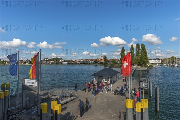 Immenstaad on Lake Constance, townscape, jetty, flags, name plate, blue sky, Baden-Württemberg,