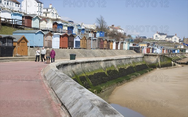 Sea wall, beach and beach huts, Walton on the Naze, Essex, England, United Kingdom, Europe