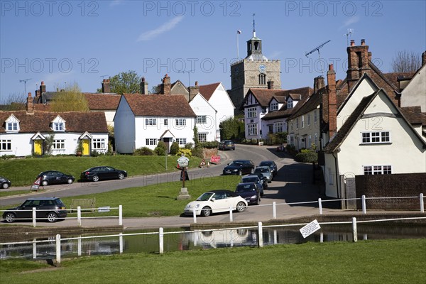 Pond and historic buildings in the attractive tourist honeypot village of Finchingfield, Essex,