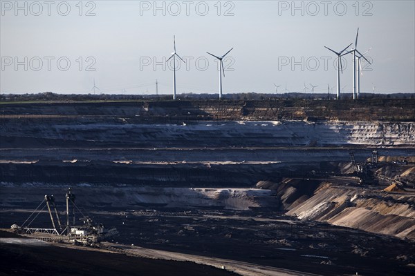 Garzweiler open-cast lignite mine with spreaders and wind turbines in the background, Jüchen, North