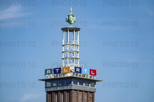 The old trade fair tower of the Cologne Exhibition Centre, with RTL logo, at the headquarters of