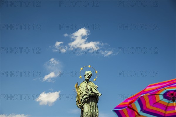 Statue of St John of Nepomuk, Charles Bridge on the Vltava River, UNESCO World Heritage Site,