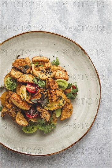 Salad, crispy eggplant in batter, with cherry, sesame seeds, olive oil, homemade, no people