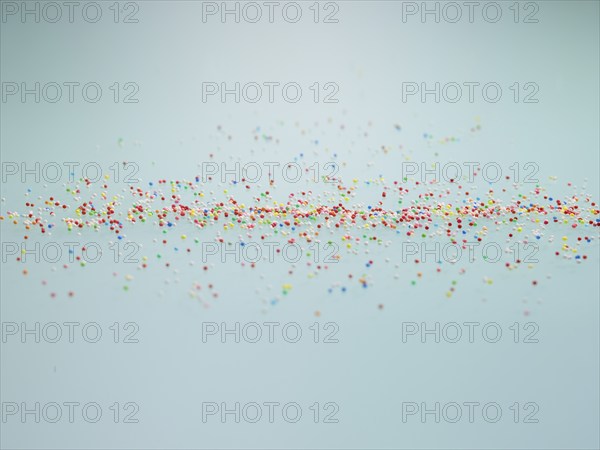 Colourful nonpareils, sugar pearls, sprinkle decorations in bright colours, mini sugar balls for