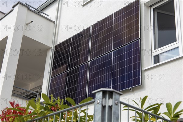 New residential building with solar modules on the façade