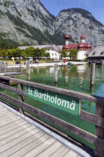 Pilgrimage church St. Bartholomä am Königssee with inscription on the jetty, Berchtesgaden National
