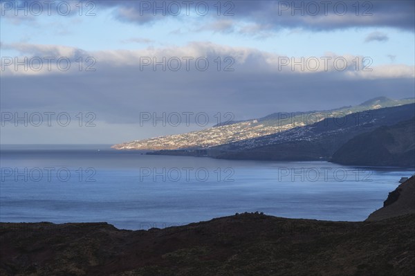 View of Funchal city and Madeira airport in the morning. Madeira, Portugal, Europe
