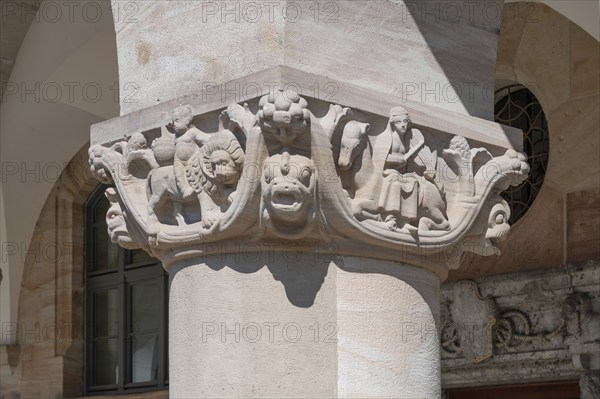 Sculptural reliefs on the columns of the arcade of the courthouse, built between 1909 and 1916 in