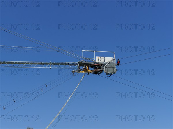 Wakeboard system with motor and ropes, technology for water sports, red signal