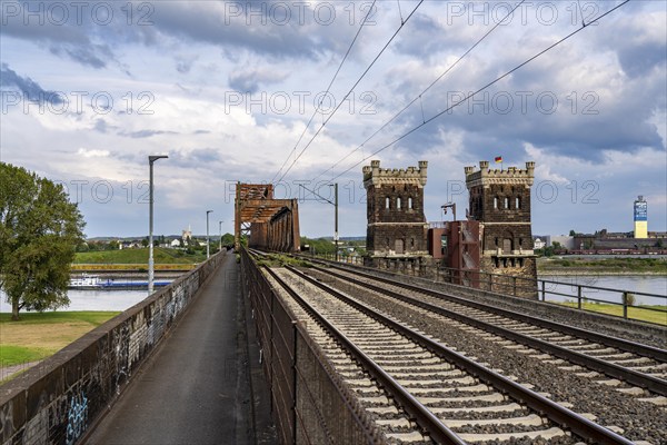 The railway bridge Duisburg-Hochfeld-Rheinhausen, over the Rhine, regional trains and many goods