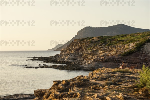 Coast with steep cliffs, sunset, Capo Caccia, near Alghero, Sardinia, Italy, Europe