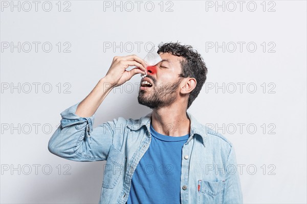 Person with irritated nose on isolated background, man with red nose cold, concept of person with