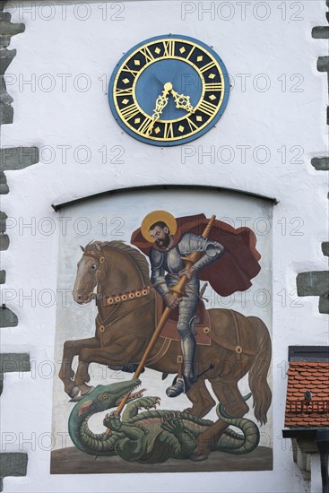 Moated castle, Lake Constance, parish church of St George, church tower clock, church patron saint
