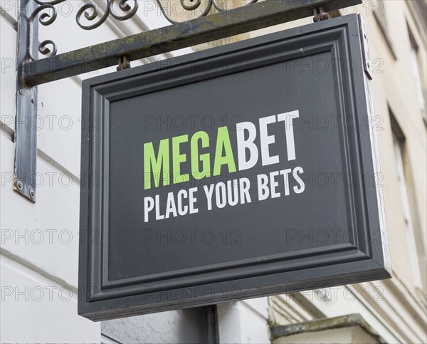 Close up of wall mounted Megabet betting shop sign, 'Place your Bets', Devizes, Wiltshire, England,