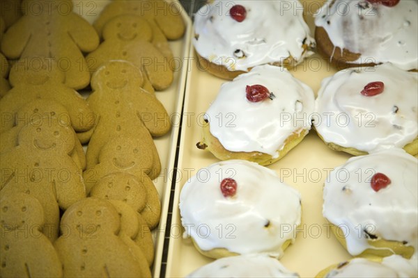 Cakes in a bakery display