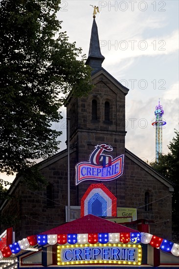 Cranger Kirche behind the Creperie and in front of the giant chain plane, Cranger Kirmes, Herne,