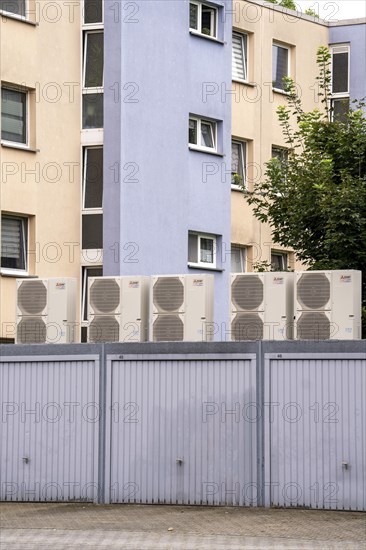 Heat pumps in a residential area, multi-family houses are supplied with heating, cooling and