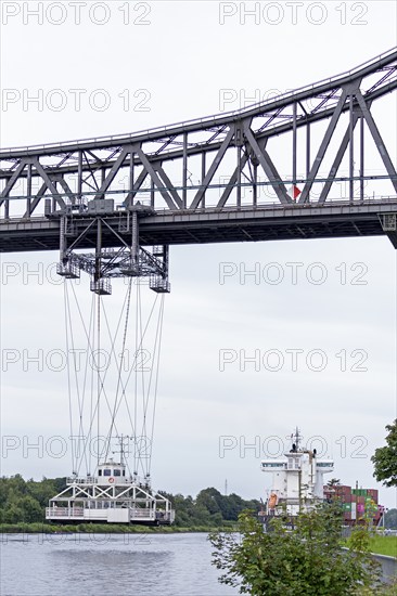 Container ship, cargo ship, high bridge, transporter bridge, Kiel Canal, Rendsburg,