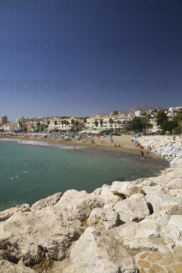 Sandy beach with bathers and hotels at Torremolinos, Costa del Sol, Malaga, Spain, Europe