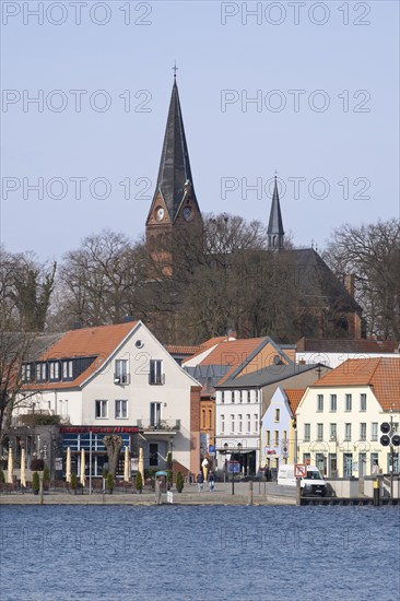 Town view at Lake Malchow with town harbour and town church, Malchow, island town, Mecklenburg Lake