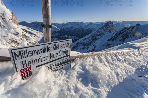 Signpost, sign for via ferrata, winter, snow, ice, Mittenwald via ferrata, Karwendel Mountains,
