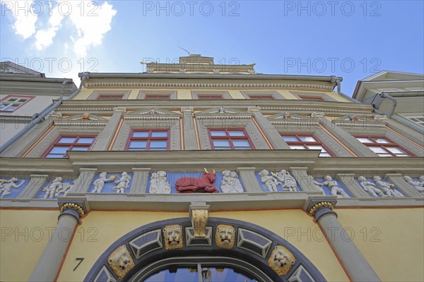 Renaissance Haus Zum Roten Ochsen, relief, sculpture, red ox figure, red, view upwards,