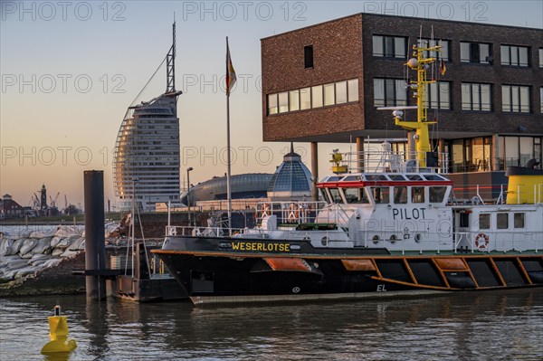 Skyline of Bremerhaven, seen over the Weser, Atlantic Sail City Hotel, Klimahaus, pilot ship in the